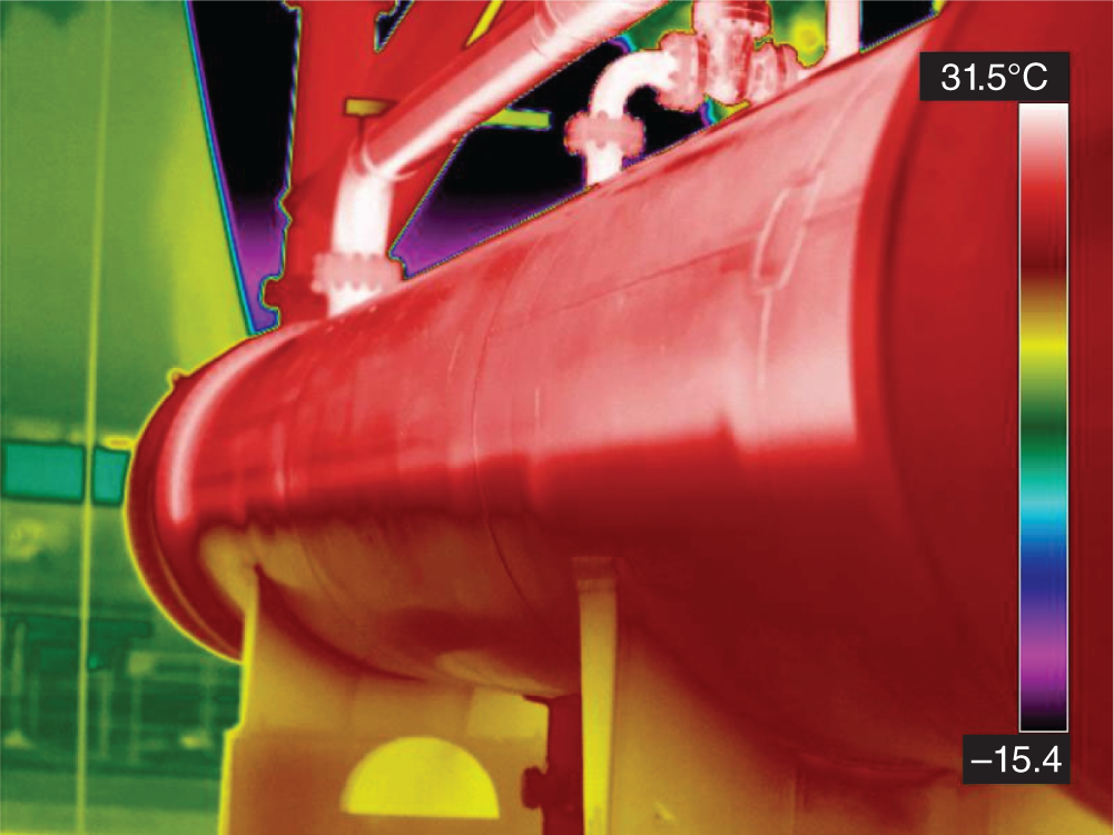 A thermal scan of a partially flooded overhead condenser. A thermal camera was used to capture this image, which displays the temperature distribution across the surface of the condenser ranging from -15.4 to 31.5 degrees Celsius.