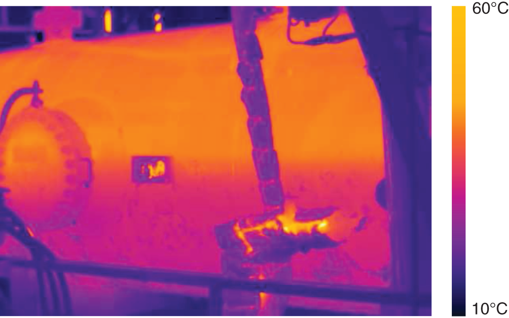 A thermal scan of a reflux drum in a hot vapor bypass system. A thermal camera was used to capture this image, which displays the temperature distribution across the surface of the drum ranging from 10 to 60 degrees Celsius.