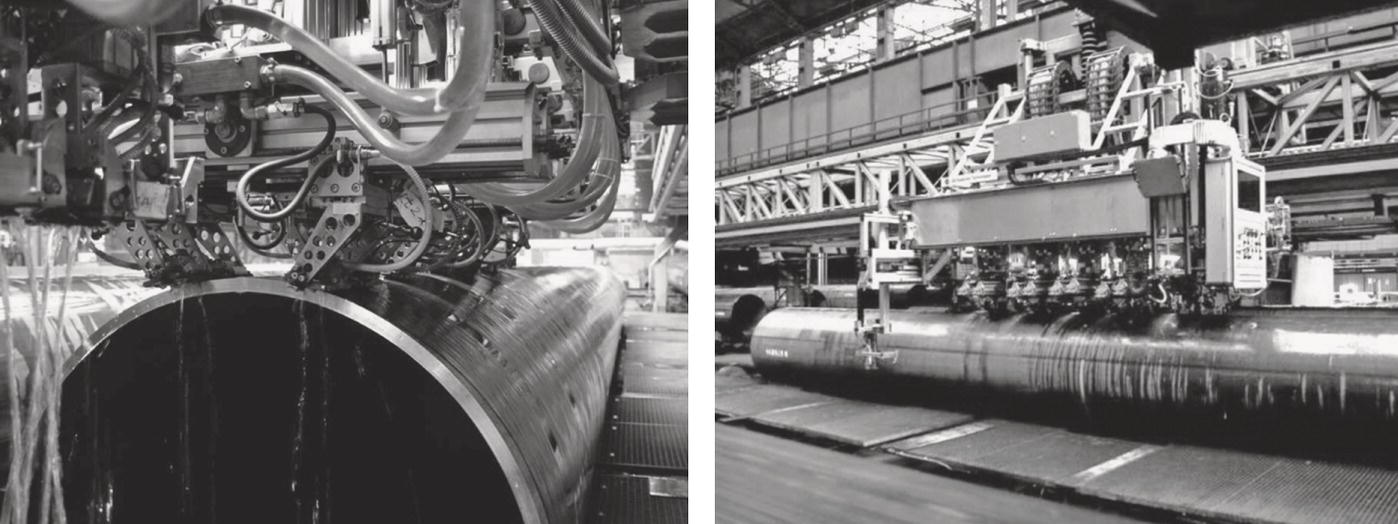 Two images of industrial machinery working on large metal pipes. The left image shows multiple hoses and clamps attached to the pipe. The right image features another machine with rollers and a framework around the pipe, under a high ceiling with structural beams.