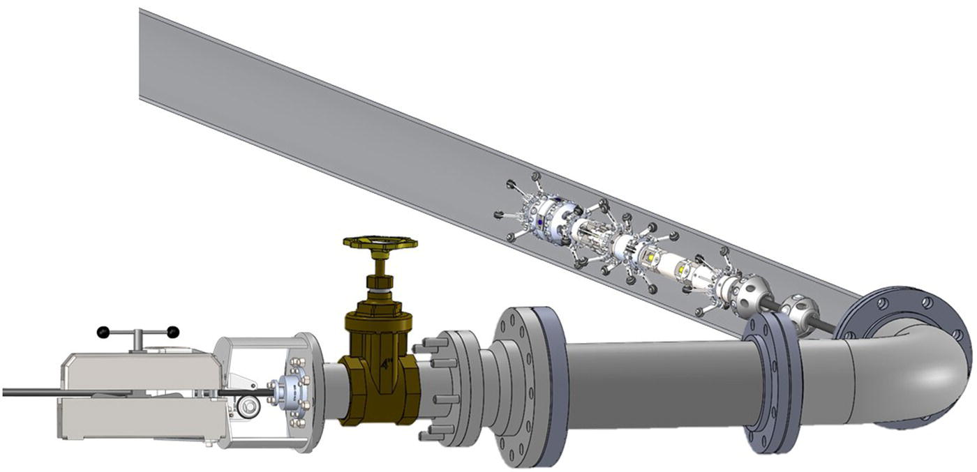 An image features a pipe system designed for fluid transportation. A horizontal pipe connects to a vertical section, featuring a valve for flow regulation. Attaching to the pipe are multiple cylindrical components aligned in a row, suggesting a mechanism for monitoring or controlling the fluid. Various connectors and flanges are visible, indicating points of attachment or maintenance. The image emphasizes a clear layout of the components, with directional arrows suggesting the potential flow path through the system.